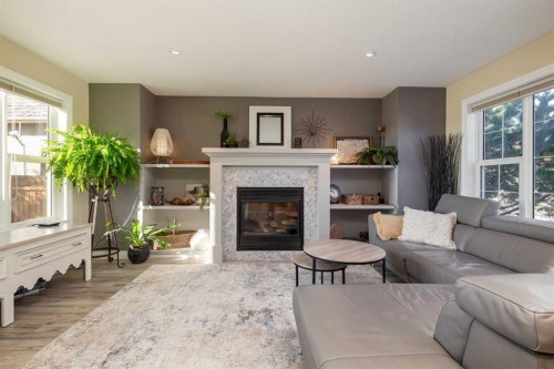 80 Canyon Boulevard West, Lethbridge, AB - Indoor Photo Showing Living Room With Fireplace