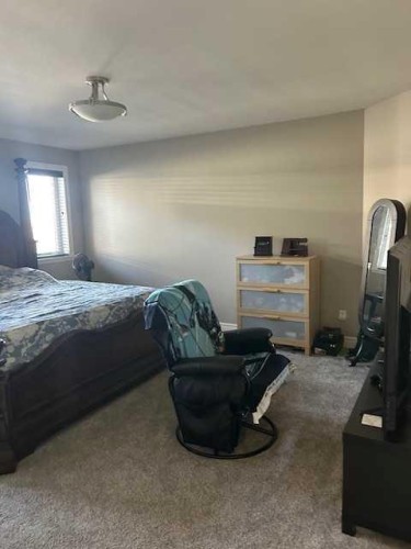 61 Westview Boulevard, Taber, AB - Indoor Photo Showing Bedroom