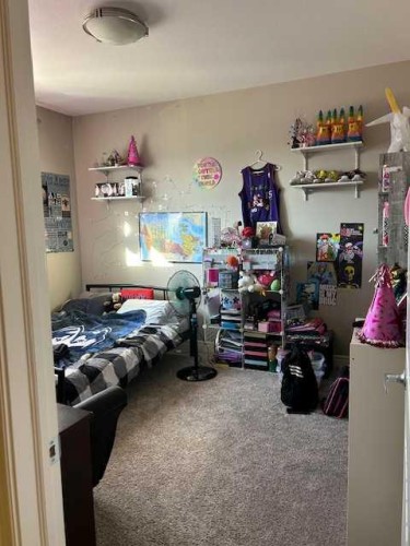 61 Westview Boulevard, Taber, AB - Indoor Photo Showing Bedroom