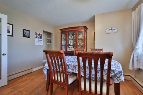 50 N 100 W, Raymond, AB - Indoor Photo Showing Dining Room