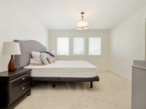660 Aquitania Boulevard West, Lethbridge, AB - Indoor Photo Showing Bedroom
