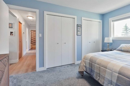 486N 100E, Raymond, AB - Indoor Photo Showing Bedroom