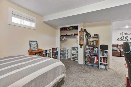 486N 100E, Raymond, AB - Indoor Photo Showing Bedroom