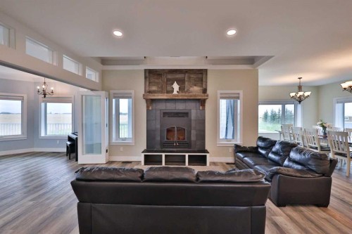 204041 Twp Rd 6-3A, Raymond, AB - Indoor Photo Showing Living Room With Fireplace