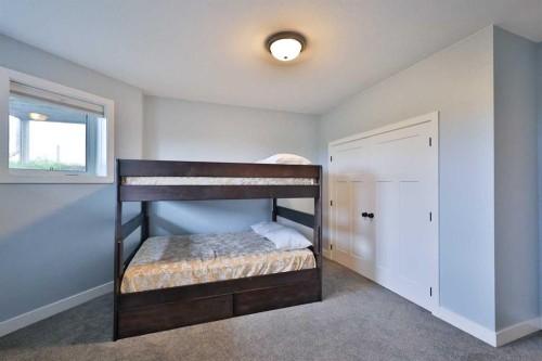 204041 Twp Rd 6-3A, Raymond, AB - Indoor Photo Showing Bedroom