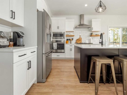 22 Prairie Sunset Ave, Taber, AB - Indoor Photo Showing Kitchen With Upgraded Kitchen