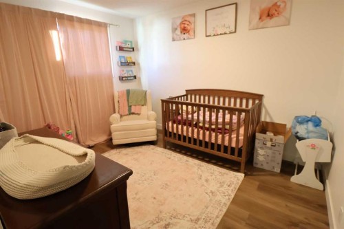 5707 50 St, Taber, AB - Indoor Photo Showing Bedroom