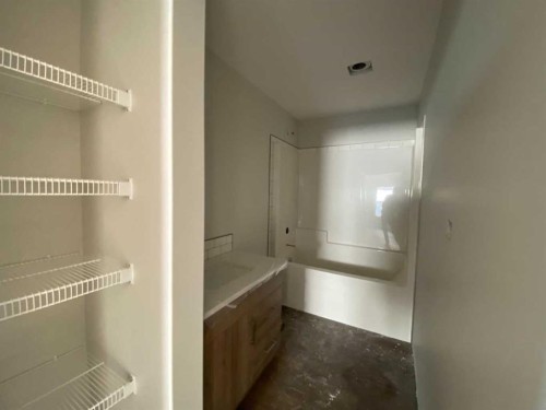 4221 57 Street, Taber, AB - Indoor With Storage