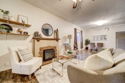 433 17 Street, Fort Macleod, AB - Indoor Photo Showing Living Room With Fireplace