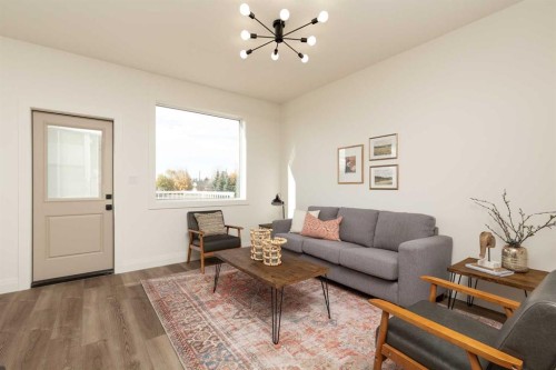 304 S 50 W, Raymond, AB - Indoor Photo Showing Living Room