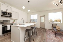 306 S 50 W  Raymond, AB T0K 2S0