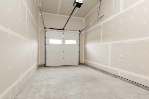 306 S 50 W, Raymond, AB - Indoor Photo Showing Garage