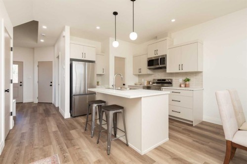 310 S 50 W, Raymond, AB - Indoor Photo Showing Kitchen With Upgraded Kitchen