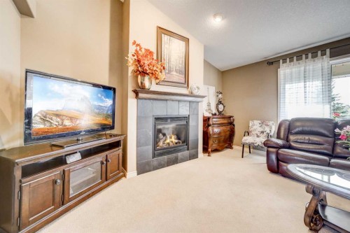 2806 35 Avenue South, Lethbridge, AB - Indoor Photo Showing Living Room With Fireplace