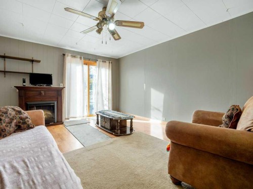 8109 16 Avenue, Coleman, AB - Indoor With Fireplace