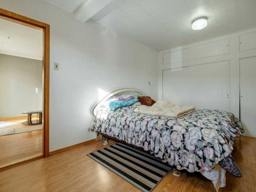 8109 16 Avenue, Coleman, AB - Indoor Photo Showing Bedroom