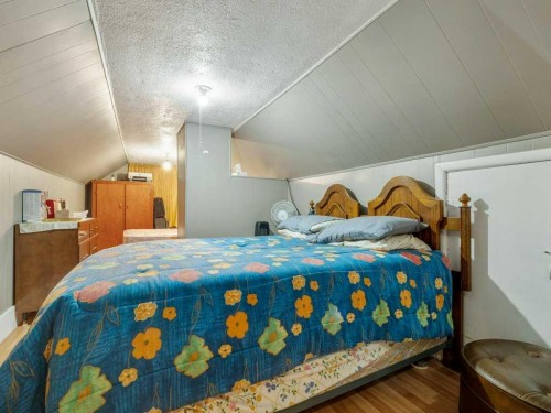 8109 16 Avenue, Coleman, AB - Indoor Photo Showing Bedroom