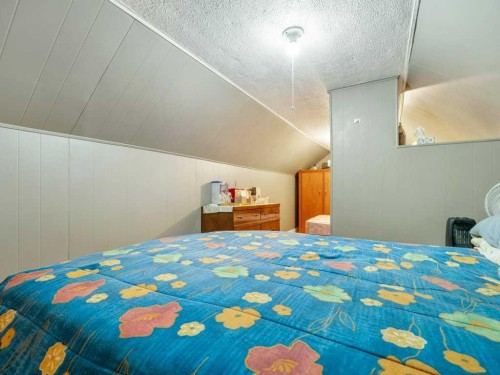 8109 16 Avenue, Coleman, AB - Indoor Photo Showing Bedroom