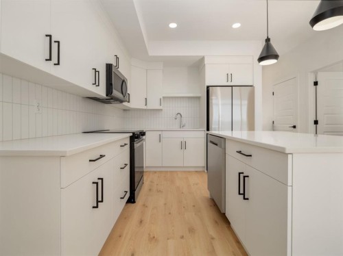 673 Blackwolf Boulevard North, Lethbridge, AB - Indoor Photo Showing Kitchen With Stainless Steel Kitchen With Upgraded Kitchen