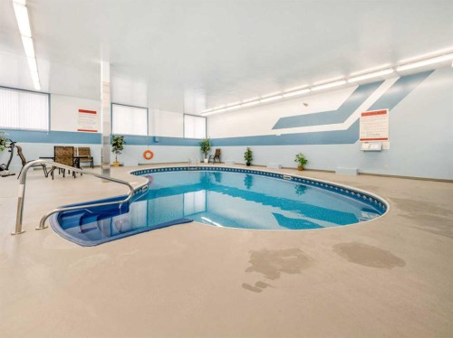 302-65 Temple Boulevard West, Lethbridge, AB - Indoor Photo Showing Other Room With In Ground Pool