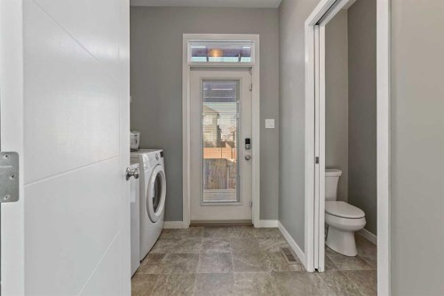 547 Blackwolf Boulevard North, Lethbridge, AB - Indoor Photo Showing Laundry Room