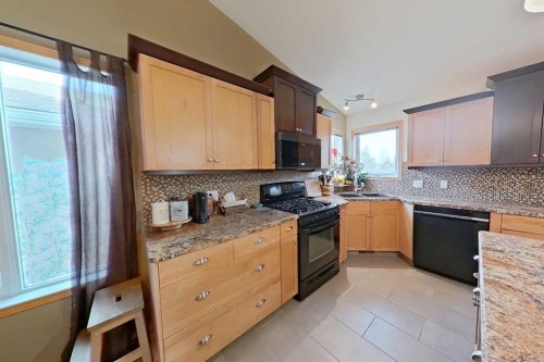 145 Blackfoot Circle West, Lethbridge, AB - Indoor Photo Showing Kitchen With Double Sink