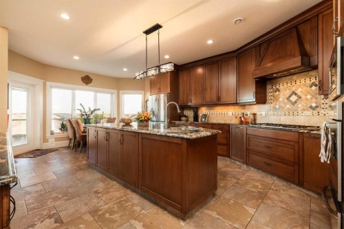 124 Canyoncrest Point West, Lethbridge, AB - Indoor Photo Showing Kitchen With Upgraded Kitchen