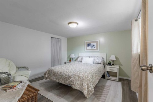 56 E 100 S, Raymond, AB - Indoor Photo Showing Bedroom