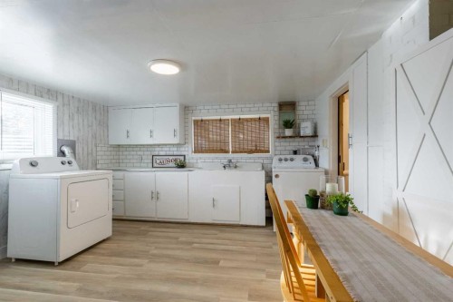 56 E 100 S, Raymond, AB - Indoor Photo Showing Laundry Room