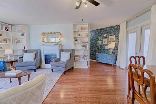 4513 Haven Place, Taber, AB - Indoor Photo Showing Living Room With Fireplace
