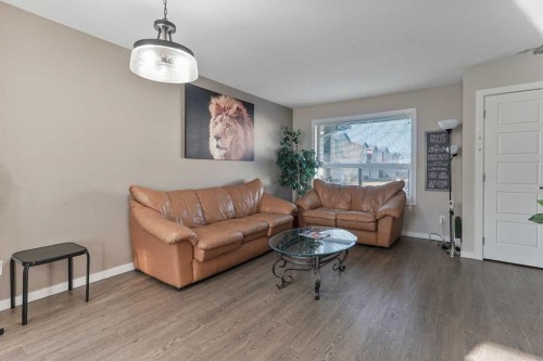 2-1180 Keystone Road West, Lethbridge, AB - Indoor Photo Showing Living Room