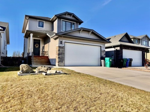 266 Lynx Road North, Lethbridge, AB - Outdoor With Facade
