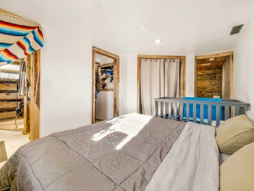 6501 22 Avenue, Coleman, AB - Indoor Photo Showing Bedroom