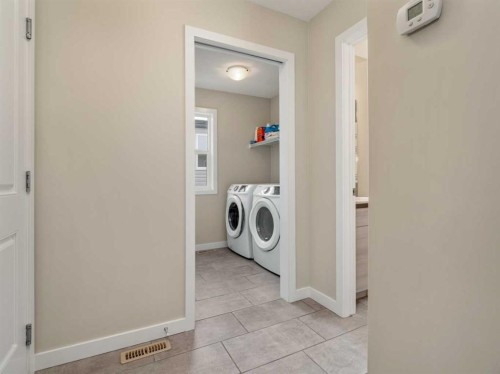 218 Grassland Boulevard West, Lethbridge, AB - Indoor Photo Showing Laundry Room
