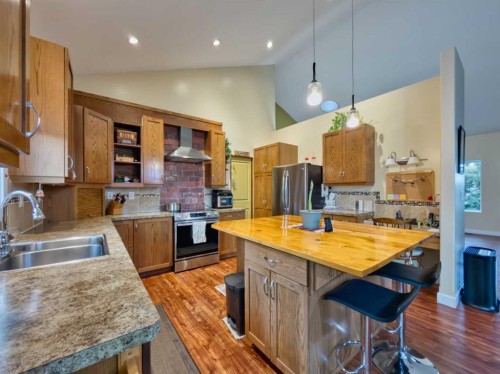 109 Adanac Rise, Hillcrest, AB - Indoor Photo Showing Kitchen With Double Sink