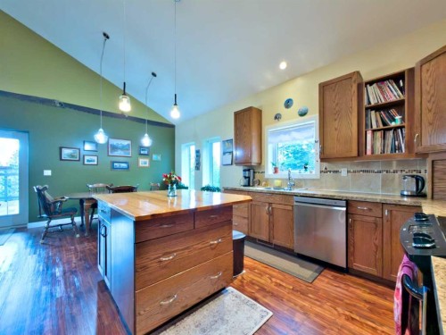 109 Adanac Rise, Hillcrest, AB - Indoor Photo Showing Kitchen With Double Sink
