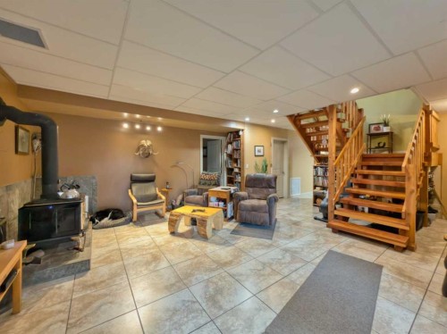 109 Adanac Rise, Hillcrest, AB - Indoor With Fireplace