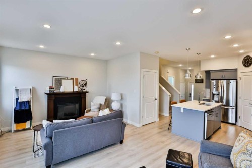 4-73 Aquitania Circle West, Lethbridge, AB - Indoor With Fireplace