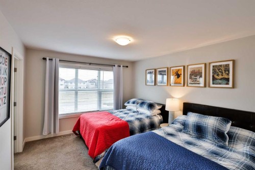 4-73 Aquitania Circle West, Lethbridge, AB - Indoor Photo Showing Bedroom