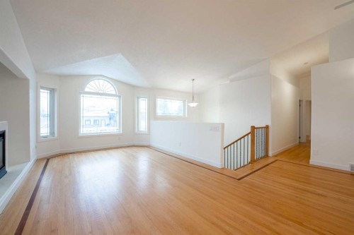 119 Grand River Boulevard West, Lethbridge, AB - Indoor Photo Showing Other Room With Fireplace