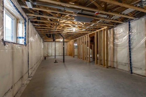 112 E 300 S, Raymond, AB - Indoor Photo Showing Basement