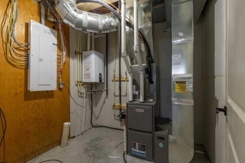 112 E 300 S, Raymond, AB - Indoor Photo Showing Basement