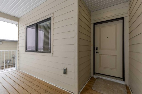 112 E 300 S, Raymond, AB - Outdoor With Deck Patio Veranda With Exterior