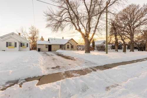 184 W 100 S, Raymond, AB - Outdoor With Facade