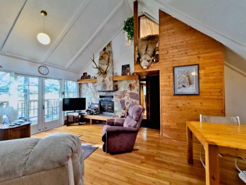 36 Lee Lake, Rural Pincher Creek No. 9, M.D. Of, AB - Indoor Photo Showing Living Room With Fireplace