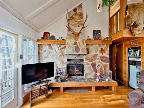 36 Lee Lake, Rural Pincher Creek No. 9, M.D. Of, AB - Indoor Photo Showing Other Room With Fireplace