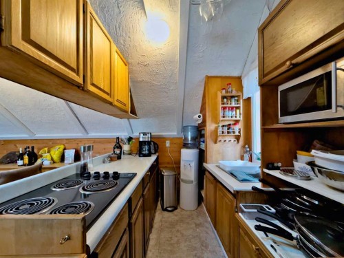 36 Lee Lake, Rural Pincher Creek No. 9, M.D. Of, AB - Indoor Photo Showing Kitchen