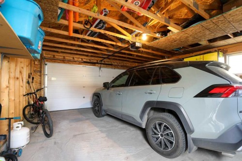 52 Lynx Road North, Lethbridge, AB - Indoor Photo Showing Garage