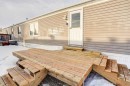 27 Westover Crescent West, Claresholm, AB  - Outdoor With Deck Patio Veranda With Exterior 