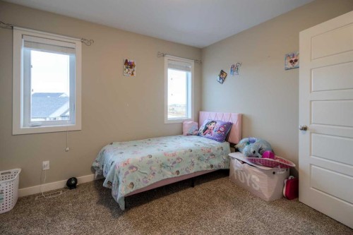 541 Aquitania Boulevard West, Lethbridge, AB - Indoor Photo Showing Bedroom